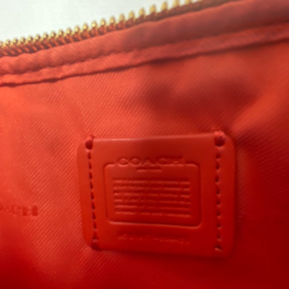 Coach camera bag with signature coated canvas detail. Shoulder/wrist strap.Coral - Picture 2 of 8